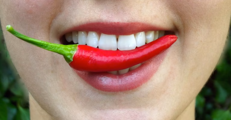 Why does chili pepper burn the mouth?